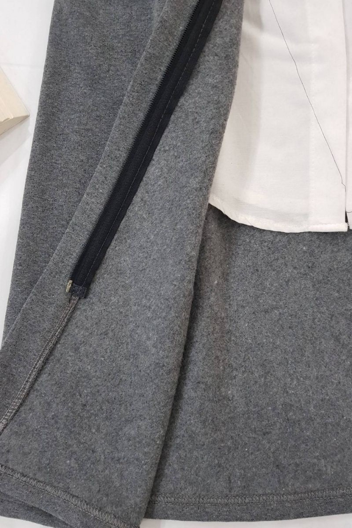 woman grey hooded three trench coats model